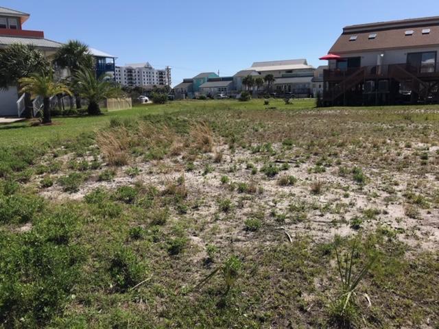 BEST PRICED LOT ON THE BEACH!!!! Perfect little piece of paradise to build your beach home! This cozy community has it all, fishing, beach, pool, great walking paths along the beach roads! Hurry, won't last long!