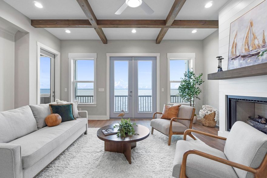 Experience the perfect blend of luxury, comfort, and coastal charm in these waterfront property. Don't miss your opportunity to own a piece of paradise on Escambia Bay. Welcome to your dream home! These brand-new construction offers an unparalleled waterfront lifestyle, situated directly on the serene shores of Escambia Bay. A private retreat offering direct access to the bay, perfect for boating, kayaking, or simply enjoying the water. Designed for both elegance and comfort, this residence boast modern architecture and thoughtful details that truly set it apart from anything you will find in that area. Wake up to stunning sunrises and enjoy panoramic views of Escambia Bay from your three private decks, perfect for entertaining, relaxing, or simply soaking in the tranquil surroundings. A spacious covered patio off the main Level seamlessly extends your living space, offering year-round enjoyment of the outdoors. With soaring 10-foot ceilings, the townhouses provide an open, airy ambiance that maximizes natural light and every detail has been carefully selected, from modern fixtures and premium flooring to state-of-the-art gas appliances. On the main Level you can enjoy the spacious family room with 10' ceiling w/large high impact windows, precisely placed for your bay view. Family room features vent-less gas fireplace to enjoy on our cool winter nights. Kitchen features white custom up to the ceiling cabinets, gas stove, quartz countertops, design backsplash and most importantly 2 car garage with plenty of parking spaces.  Window seats for all windows.  Sooooo many extras and elegant touches to this home!  Up to the 2nd level is the elegantly appointed master bedroom/bath suite w/quartz tops dual vanities, tiled shower, designer walk-in closet & large sundeck; along w/2 other bedrooms that share a bath. 