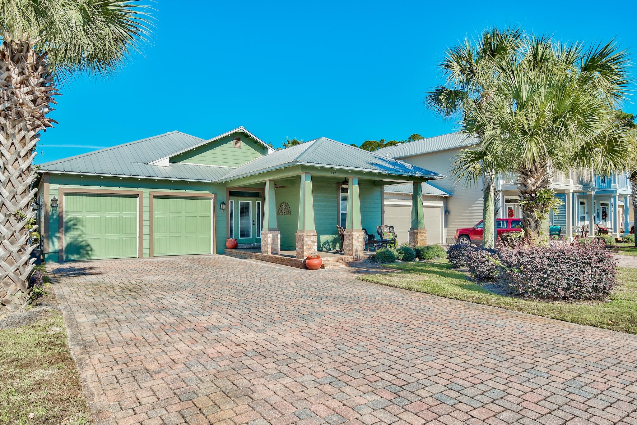 This Charming Florida Craftsman Design is in the highly desirable neighborhood of Eagle Bay. Hardi board siding, metal roof, front porches and paver driveways complete the look! This spacious great room plan opens to the wonderful kitchen adorned with granite counter tops, stainless steel appliances with Kitchen Island with breakfast bar & gorgeous tile throughout except carpet in the bedrooms. The high vaulted ceilings & window placement make the home light & bright! The refrigerator, washer and dryer convey with the home. Sit out on the covered porch with your morning coffee and watch the sunrise. Walk to the bay and go fishing! Or bring your kayak & watch the dolphins at sunset. Great location, shopping, restaurants, & to Sacred Heart Hospital. Enjoy the Charm of ''Santa Rosa Beach.''