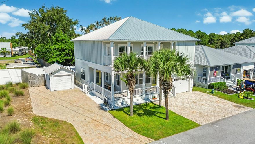Assumable Loan at 2.75%!!! Welcome to Paradise, where coastal living meets modern comfort! Located just 4 blocks from the beach in a gated community with a community pool, this spacious 4-bedroom, 4.5-bath home offers the rare convenience of two masters suites and four ensuite bathrooms!! Positioned next to a large stretch of community greenspace, the home enjoys added privacy and room to breathe, while two separate garages provide ample storage and parking. Inside, you'll find recent updates including new WPC luxury vinyl plank flooring, fresh Benjamin Moore paint, and spray foam insulation in the crawlspace for enhanced efficiency. Outside, you'll find an outdoor shower, plenty of porch/balcony space, and a sprinkler system. The home has been professionally cleaned and prepped, ensuring a smooth move-in for its next owners. Don't miss your chance to own a like-new, move-in-ready home in Laguna Beachjust minutes from the sand, shopping, dining, and entertainment. Schedule your showing today and experience Paradise!