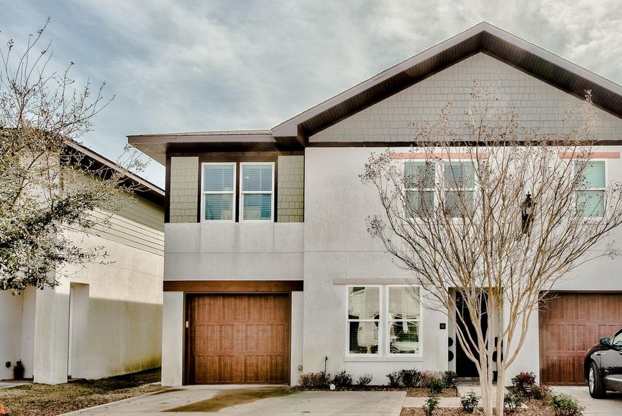 Destin Oaks 36 is located within a luxury-townhome  neighborhood. This is a beautiful 3 BR, 2.5 Bath, TH with 2,078 sq. ft living space in an open floor plan. Attention to decor and fine living by the owner includes coastal interior design, a well-appointed kitchen, and beautiful finishes throughout the home. Upgrades include custom cabinetry, large kitchen island, farmhouse sink, appliances, crown molding throughout, wet bar with ice maker/sink, lighting, countertops, tiles, and sound system. Master BR hosts a beautiful spacious custom closet.  Smart home technology allows control of the door locks and thermostat. The garage is climate-controlled and is an end unit with a side yard. All dimensions and Homeowner Dues to be verified by Buyer.Homeowner community is professionally managed. Amenities include community pool and club house. the Destin lifestyle and live close to the beach, shopping, dining, and championship golfing. 