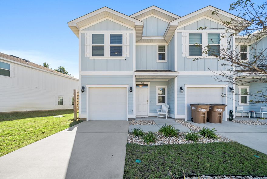 *SELLER OFFERING SELLER CONCESSION FOR A 2 POINT INTEREST RATE PERMANENT BUY DOWN AT CLOSING* Turnkey Vacation Home or Income-Generating Rental! This beautifully appointed townhome is turnkey ready and fully furnished, making it the perfect opportunity for a vacation rental or a high-performing investment property. Boasting one of the largest end-unit lots in the neighborhood and featuring NO carpet--just stunning, easy-to-maintain luxury vinyl plank flooring throughout. Professionally decorated by an interior designer, this home is filled with elegant finishes including designer lighting, modern nickel hardware on all doors, and sleek granite countertops in the kitchen and bathrooms. The kitchen has stainless steel appliances (range, microwave, dishwasher) and a Kinetico water filtration system. The spacious master suite features a double vanity with granite counters and a walk-in closet. Enjoy modern convenience with a smart home package including a Kwikset keyless entry lock, Echo Dot, and a Qolsys touch panel for easy home control. A built-in security system with ADT offers peace of mind, with motion sensors and exterior cameras ensuring safety and monitoring. For added comfort, the home features a neat dial for precise A/C control, and the living room couch comes equipped with electric recliners and built-in USB ports, perfect for relaxation after a long day. Located just 10 minutes from the beach, you'll enjoy easy access to sun, sand, and surf, making this townhome the ideal retreat or rental property. With its unbeatable location, modern amenities, and stylish design, this townhome is truly ready for immediate use as a vacation retreat or rental. Don't miss out on this rare opportunity!