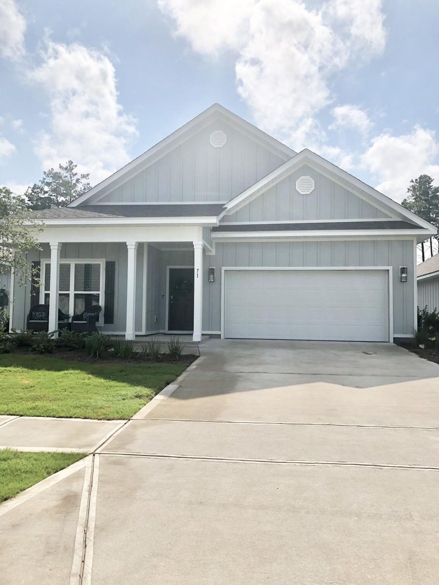 Welcome to Firefly located in Hammock Bay! This community has it all - pools, a 24-hour fitness center, dog park, tennis/basketball courts, fishing pier and so much more. These homes are constructed with 4 sided Hardie, aluminum fascia with vinyl sofits, a reinforced concrete foundation, weather resistant house wrap barrier, and dimensional shingles with a 30 year warranty. This is the Dover plan. Standard features of this home include elegant 9' ceilings, EVP flooring throughout the common areas, and carpet in all bedrooms. The home also includes stainless steel Whirlpool appliances including a stove, microwave and dishwasher.