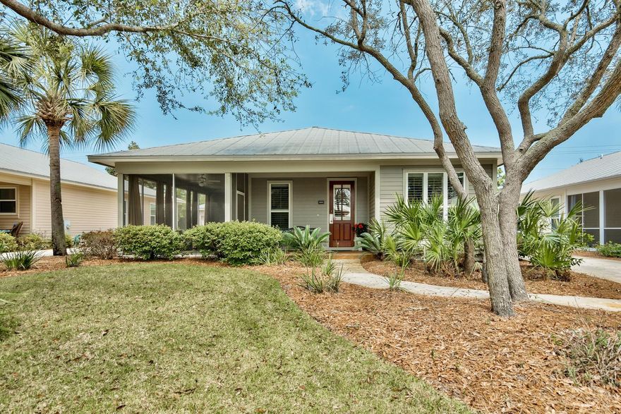 Where Simplicity, Class, Convenience and Outdoor Living Converge. This lovely cottage style home feels like a new house with attractive wood and tile floors, new stainless steel Bosch appliances and upgraded HVAC. The carport protects your vehicle while the screened porch, pagoda and open covered porches provide privacy and fresh air places to dine, entertain and relax. From its curb appeal and tidy landscaping to the wooden picket fence, the house radiates casual comfort. Warm neutral walls are framed with crisp white trim. The open kitchen design has a large pass-through space to the living room which keeps the cook in the conversation while he or she enjoys the advantages of a gas stove. A natural stone back splash features small diamond-shape insets.