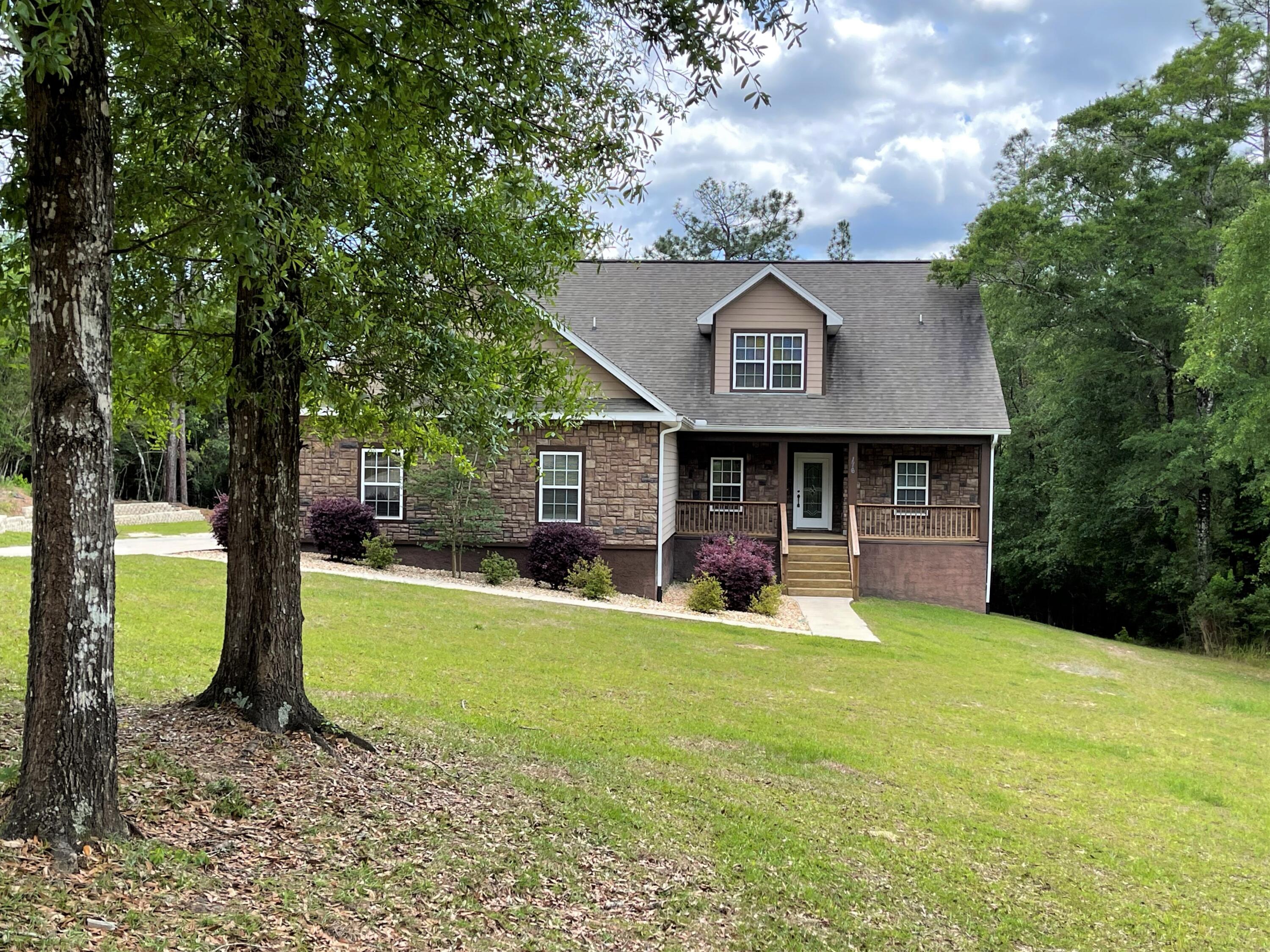 If you like a little elbow room near the edge of town, but close to all amenities, this could be the home for you. This beautiful custom built home sits regally on just over an acre, has space galore, both inside and out. The exterior features a beautiful stone paired with hardy board and is a real eye pleaser. The interior has spacious rooms, to include a kitchen that has space for multiple chefs! Tons of cabinets, double oven, pot filler, granite counter tops, stainless steel appliances and more. The master bedroom is downstairs and there is a huge family/playroom upstairs. There's a lot to see here so call to see it today! You won't want to miss out on this rare 5 bedroom home! If you are a VA qualified buyer, you may be able to assume the buyer's current mortgage at a rate of 2.25%,