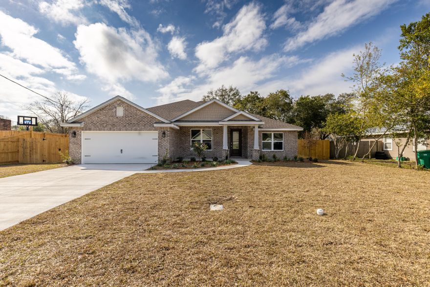 Another marvelous home built by local reputable builder. This 4 bedroom and 3 bath is beautifully built in the heart of Fort Walton Beach. Split floor plan with an open kitchen area to enjoy many friends and family members. Kitchen has custom white shaker cabinets with easy close doors and drawers, granite countertops in kitchen and bath, stainless steel appliances, including refrigerator and impact windows. Living room and master bedroom feature tray ceilings. Large master bath with double vanity, frameless glass shower and free standing tub. Home includes sprinkler system and privacy fence with gate. Property features impact windows and doors. Short distance to downtown Fort Walton Beach, 10 minute drive to the beach & near both Eglin AFB and Hurlburt Field AFB.