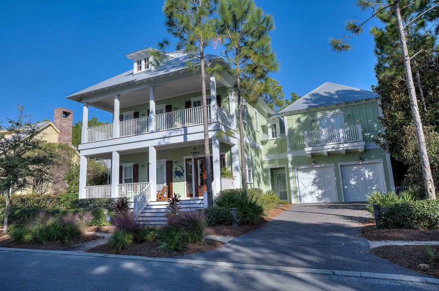 This beautiful Watercolor home is a must see. 3905 sq ft home is located on a private lot that is surrounded by two protective spaces that will not be developed and the street has no pass through traffic. Fall in love with the large private fenced-in backyard which showcases an in-ground black bottom pool with integrated Jacuzzi (featuring a waterfall into the main pool), Outdoor Chicago Brick Isokern Fireplace, Outdoor shower and a professional built-in gas grill all surrounded by large beautiful trees. The interior is just as beautiful and welcoming with many spectacular finishes from the grand gas lamp on the front porch to the impact rated mahogany double front door, opening to the grand foyer with antique Chicago brick walls and antique white oak floors throughout the home.
