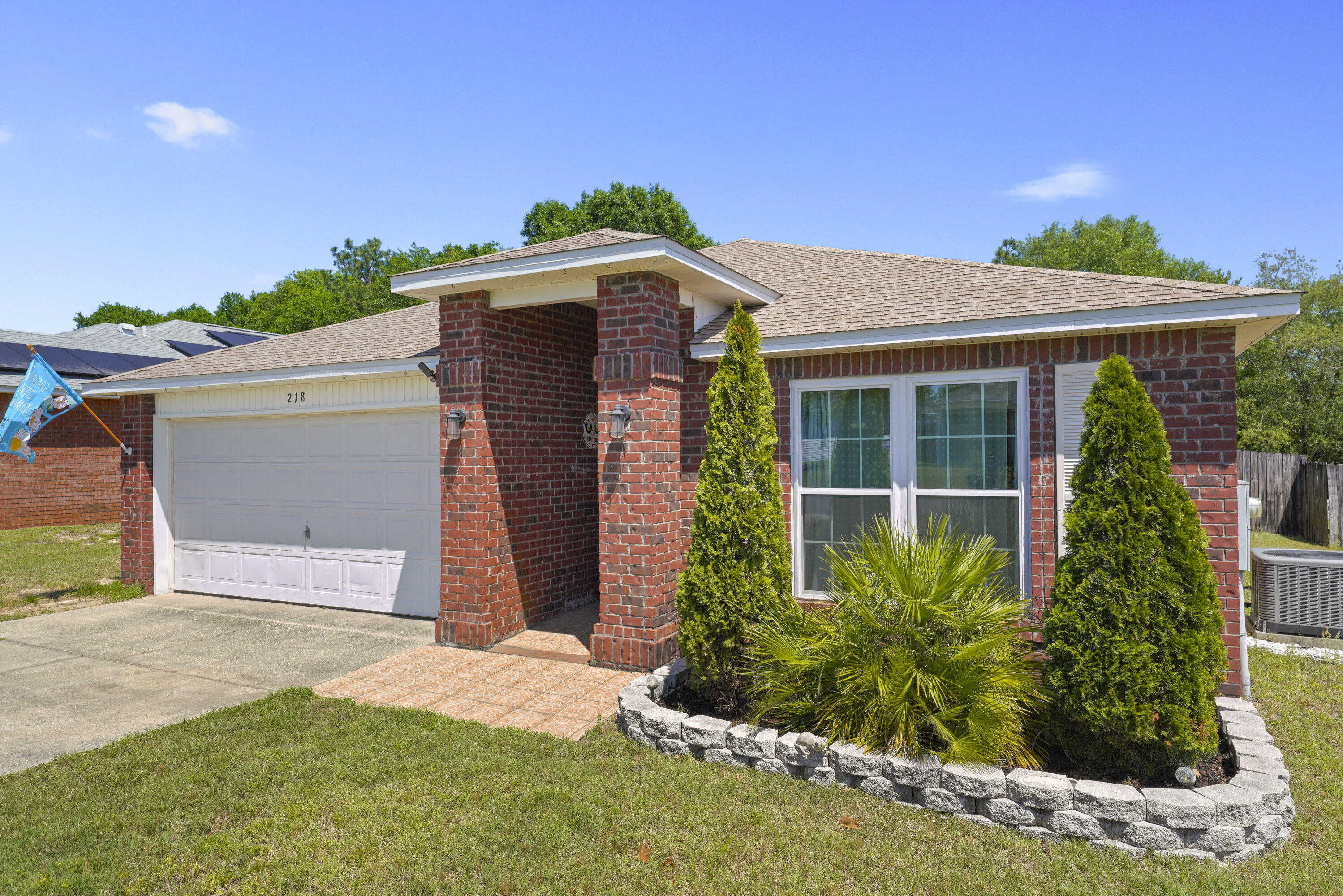 Improvements include new and newer features such as brand-new Hot Water Heater in April 2024, all new Energy Efficiency Low-E glass windows 2023, new Rheem HVAC 2019, new ROOF 2018, new dishwasher and range, laminate flooring, custom designed Master Bath Room closet, toilet, plush carpet in Master Bedroom, ceiling fans, door hardware, and outside storage shed to name only a few. This affordable, updated treasure in Redstone Estates, a quiet community built just for you, convenient to medical facilities, dining and shopping galore. This exceptionally gracious 3BR 2BA home speaks pride of ownership and classic charm. The spacious living, dining, kitchen and den space will be the center of your living and entertaining. Serenity is the mood of the screened enclosed Florida Room...the perfect