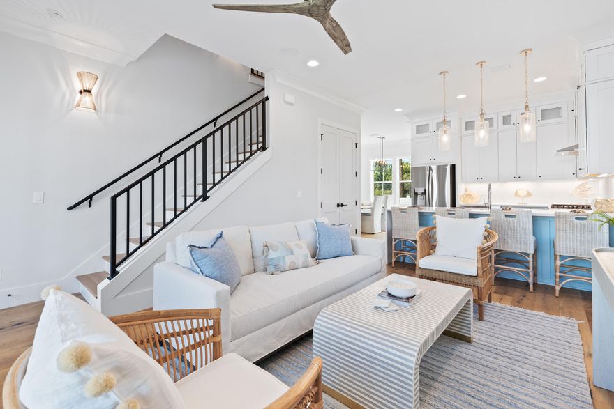 Introducing Unit #39A at Century 393, a professionally designed, fully furnished show residence in Santa Rosa Beach just moments from Scenic Highway 30A. This exceptional townhome was upgraded throughout during construction as the developer's personal unit, resulting in elevated finishes and custom details not found elsewhere in the community. Spanning 1,914 square feet of heated and cooled space (2,412 under roof), the home features 3 bedrooms, 4.5 bathrooms, and a versatile bunk room. The kitchen is truly one of a kind, showcasing upgraded cabinetry, enhanced finishes, and designer selections, while the primary suite stuns with coffered ceilings accented in pecky cypress, creating a warm, coastal-luxury retreat. The main living level offers an open-concept layout ideal for entertaining, with seamless flow between the kitchen, dining, and living spaces. Additional conveniences include a walk-in pantry, powder bath, laundry room, and private one-car garage. Upstairs, the primary suite features a spa-inspired bath, while guest bedrooms each include ensuite bathrooms for comfort and privacy. The bunk room provides added flexibility with access to a full bath. Outdoor living includes a fenced backyard with a built-in summer kitchen. Offered fully furnished with professional design at an aggressive price point, Unit #39A presents a rare opportunity to secure a turnkey, upgraded residence to establish immediate value within Century 393.

Future expansion plans for Century 393 include thoughtfully designed neighborhood amenities such as a resort-style community pool, sun deck, cabana, pickleball courts, communal green space, and dual gated entrances, further enhancing the lifestyle appeal, privacy, and long-term value of this modern coastal community.