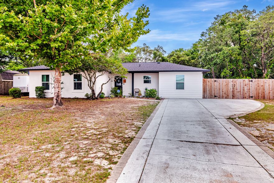 This beautifully renovated home offers the perfect blend of comfort, convenience, and style--just a short drive from both Eglin and Hurlburt Air Force Bases and minutes to the beach. Enjoy peace of mind with major updates already completed: a brand-new roof in 2023, all new windows in 2024, plus an HVAC system and water heater both installed in 2020. Step inside to an open-concept floor plan where the modern kitchen seamlessly flows into the spacious living and dining areas--perfect for entertaining or relaxing with family. The oversized master suite is a true retreat, featuring a large walk-in closet and a luxurious master bath.Out back, enjoy your private deck equipped with shaded pull-downs and a projector screen--ideal for cozy movie nights.