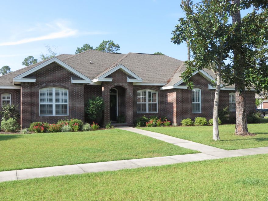 This custom built home by Courington has everything a family would be looking for, with 4 bedroom, 3 bath, located in Bayshore Place. From the moment you enter the home you will love the layout, design and all new wood floors. The large formal dining room has upgraded window treatments, recessed lighting and crown molding. The living room is flanked by a gas fireplace, and has crown molding, recessed lighting, high ceilings. The gourmet kitchen features granite countertops, stainless steel appliances, maple cabinets, recessed lighting, 18'' tile flooring, breakfast bar, large walk-in pantry