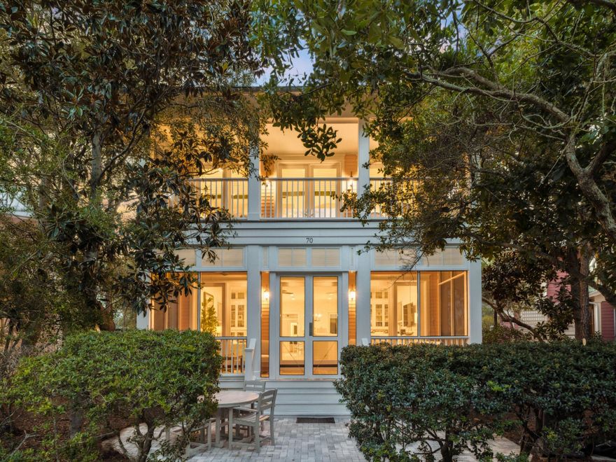 Tucked away in the coveted Park District of WaterColor Phase I, 70 Sunset Ridge Lane is light, bright, and open, having undergone a complete remodel in 2021 to pair the charm of classic coastal architecture with thoughtful modern updates.  Located in the intimate Rose Garden Mews, one of only twelve homes encircling the lush and peaceful Crimson Park, this residence offers a rare blend of privacy and accessibility.  Designed to bring the beauty of the outdoors inside, the home's serene setting is complemented by its proximity, less than 1,000 steps, to the WaterColor Beach Club, the WaterColor Hotel, and Marina Park, and within easy walking or biking distance to tennis courts, Camp WaterColor, and Seaside. On the main level, a spacious open-concept living, dining, and kitchen area creates the perfect space for entertaining and everyday enjoyment. A guest bedroom with a private en suite, a convenient powder room, and a generous screened-in front porch overlooking Crimson Park provides both comfort and functionality.

Upstairs, the primary suite boasts a private, covered balcony with park views, providing a serene setting to start or end your day. Two additional guest suites each feature en suite baths, while two upstairs sitting areas offer flexible spaces for lounging, working, or even adding a bunk room if desired.

The renovation included full bathroom updates, fresh interior paint, and a tankless water heater. All windows and doors were replaced with hurricane-impact-rated versions, enlarged to increase natural light, and hurricane shutters were added to every window. The property also benefits from access to four HOA-dedicated parking spaces, a rare and valuable amenity in this prime location.