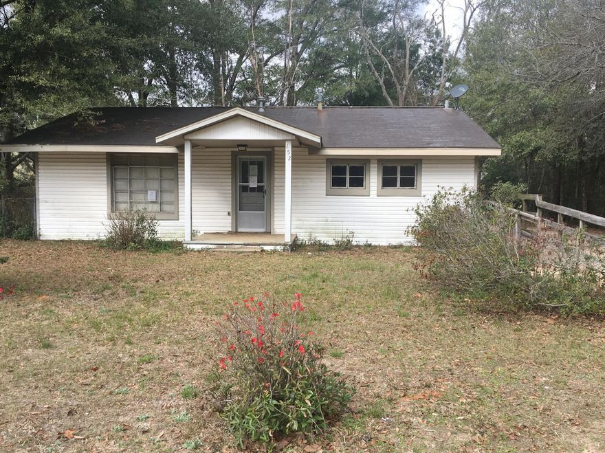 Handyman Special 3BR/1BA home situated on a large wooded lot in a quiet neighborhood of Northeast Crestview. This fixer upper is an excellent investment opportunity in a fantastic location. Featuring a large living room, spacious kitchen/dining combo, 3 nice size bedrooms and a fenced in backyard providing plenty of privacy. Located close to shopping centers, schools & parks, with easy access to I-10. All Information recorded in the MLS is intended to be accurate but cannot be guaranteed, buyer advised to verify. Sold As-Is. No utilities will be turned on to this property and only cash/renovation loan offers with 0 day inspection period will be considered. Buyer should perform their due diligence/necessary inspections before submitting an offer.