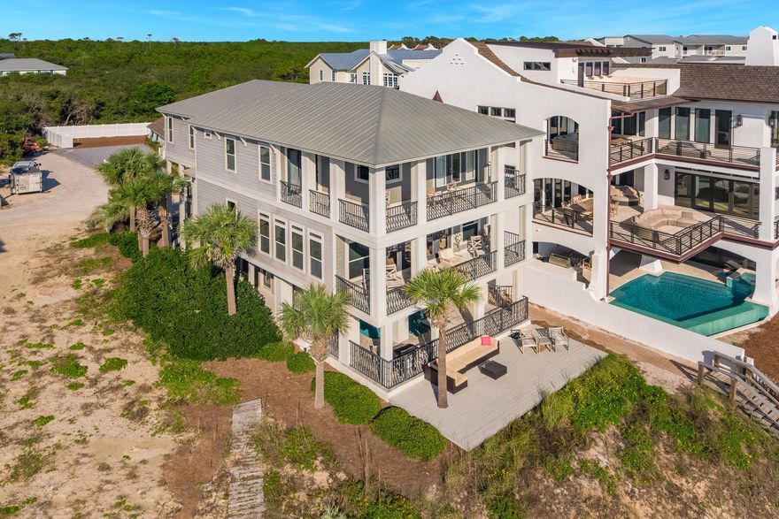 Incredible gulf front home in a highly sought after and private neighborhood! Take in the unparalleled views from the open kitchen and living area on the second floor. This perfect beach retreat sits atop some of the tallest dunes on 30A. It's ideal for a rental or second home with five bedrooms all with en suite bathrooms. Two of the bedrooms are gulf front. Hardwood floors, stainless appliances, and plenty of porch space on every level make this home a must see. There's an additional full bath downstairs near the private pool. This beautiful home is a short stroll from ALYS Beach, Rosemary Beach, and Kaiya. The private street will soon be gated and paved!