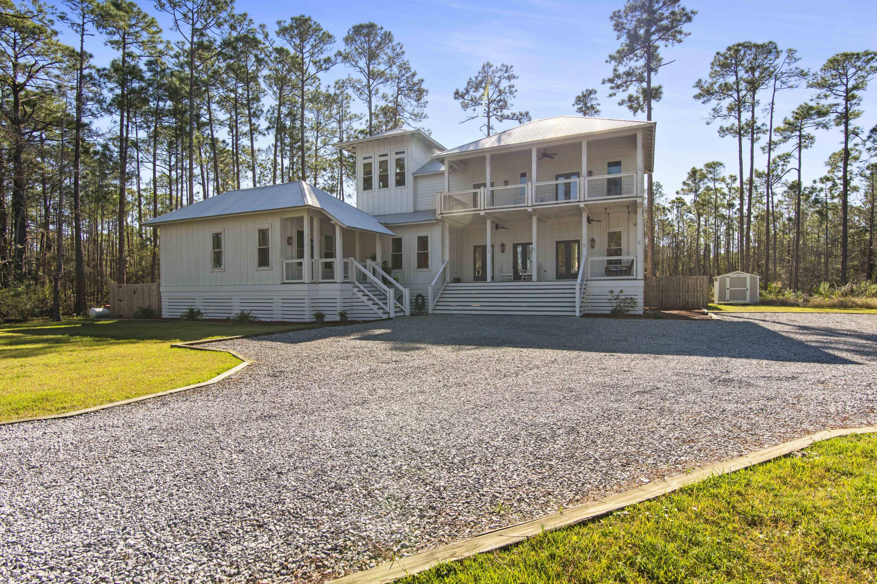Beautiful Bay View Home.  This home offers granite countertops, first floor owners suite with walk in closet and clawfoot tub. Enjoy your own Porch off the owners suite or the Bay views from the Balcony and office tower!   Deeded Bay Access!  Don't miss out on this rare opportunity to own an acre in Santa Rosa beach with plenty of room to add a carriage house/garage.