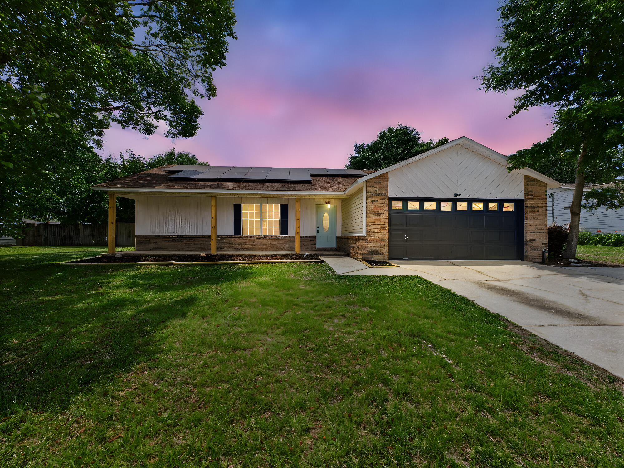 Beautifully updated 3BR/2BA home with modern finishes and paid off solar panels. Features include custom butcher block counters, hex tile backsplash, black appliances, and soft mint cabinets. Both bathrooms are fully renovated with sleek black fixtures and stylish vanities. Enjoy new flooring, fresh paint, and a bright, open layout. The primary suite offers a walk-in closet and spa-like bath. Spacious fenced backyard and a clean, painted garage add to the appeal. Convenient Crestview location near schools, shopping, and bases--move-in ready!