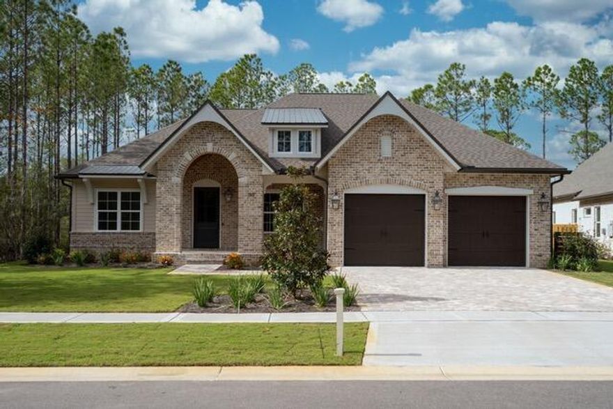 Oversized lot in the exclusive gated community of the Vineyards at Hammock Bay.  Reisling 2 floor plan will feature 4 bedrooms plus a flex space and 3 bathrooms.  Professional grade appliances in kitchen which also features Wood harbor cabinets and quartz counter tops.  Award winning builder includes wood floors in all living areas, crown moulding, cased windows and oversized base boards.  Each home features gas lanterns, pavestone driveways and lush landscape.