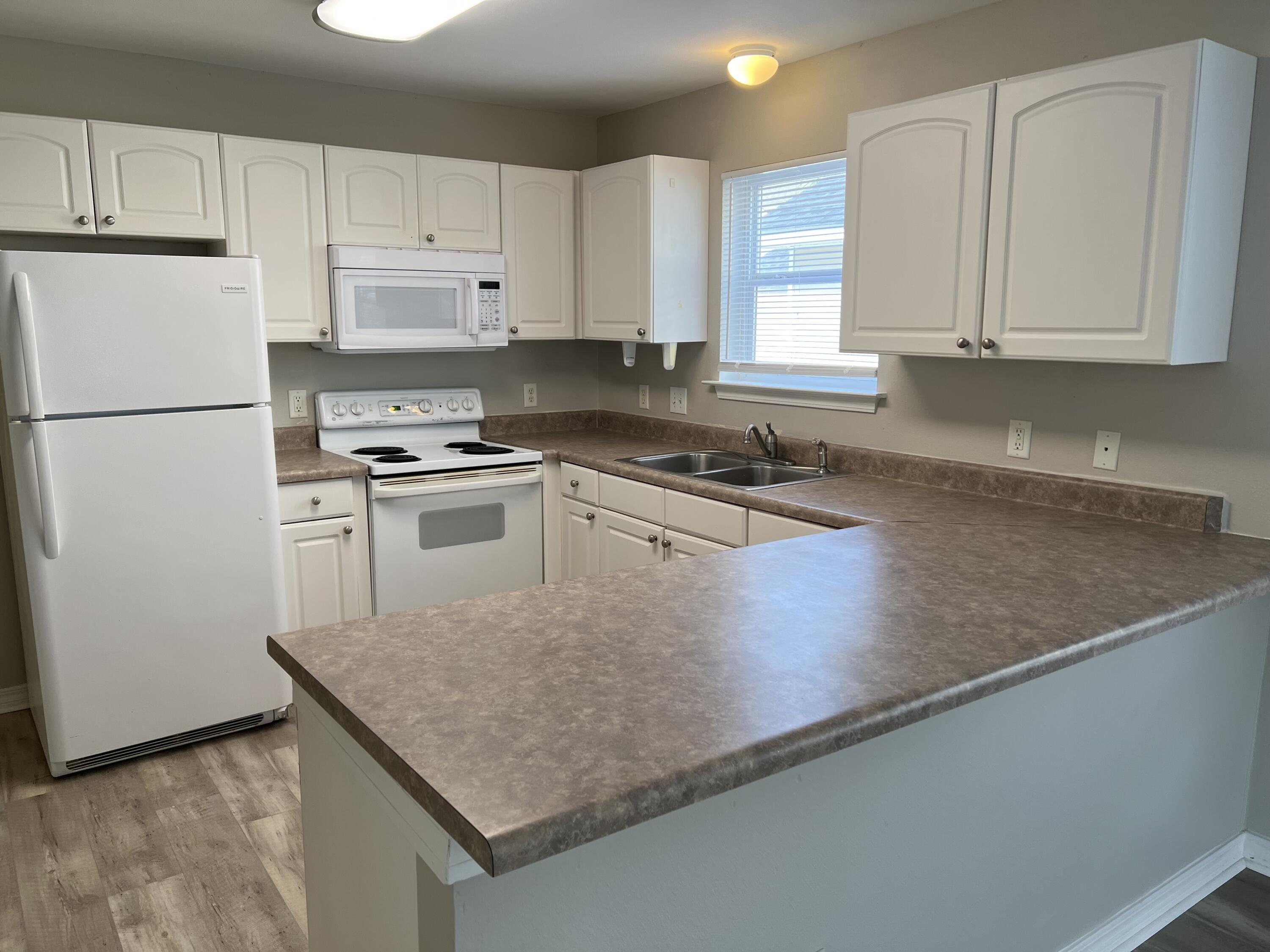 ENCHANTED ESTATES - Residential Lease