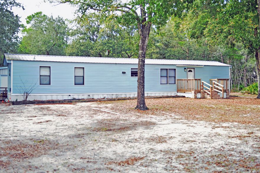 Come see this well maintained 2 bedroom, 2 bath mobile home located in a quite freeport community. This home has so much to offer, starting with a convenient location, peaceful setting on a large lot, plus an easy commute to Destin / Miramar Beach and surrounding areas.  This fully furnished home offers the convenience of a large fully equipped kitchen, large master suite, spacious Family room, and relaxing screen porch. Call today to schedule a showing of this amazing home.