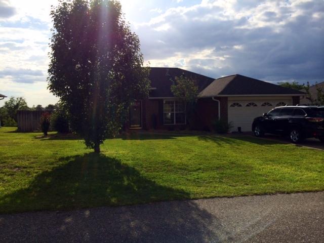 Lovely 3 bedroom, 2 Bath home with additional office space/den. Split bedroom plan, large Living Room, Eat In Kitchen with island and granite counter tops (2014), newer cabinets, newer flooring throughout, new AC 2014, newer all fans and lighting fixtures. Home has wood and tile throughout, tiled shower. Back deck with privacy fence that backs up to woods.Gorgeous home !!