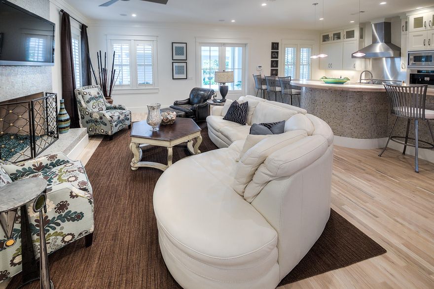Sand Hill Circle is one of the most desirable locations in Watercolor and this home has NEVER been rented. This beautiful home sits directly across from the frog pool in Phase III of WaterColor. The home has a welcoming front porch complete with rocking chairs & gas lanterns. The home also has a large back porch with an outdoor shower & continues to a private covered outdoor gathering area. This space is complete with an outdoor gas fireplace, BBQ area, wet bar & TV. The rear of the house includes an over sized 2 car carport with plenty of parking and storage closet. The large room over the carport is perfect for finishing out as a privately accessed mother-in-law suite or game room.