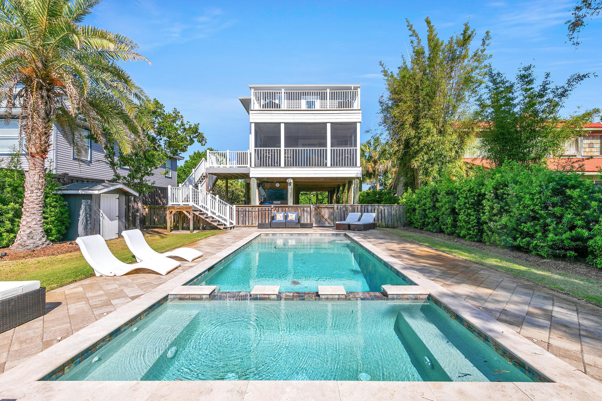 Gorgeous 3 bedroom/3 bathroom beach house with everything you need! Private pool and hot tub, just 1 block from the beautiful Gulf, and open concept living room/dining room/kitchen for entertaining family and friends. Home is beautifully renovated with quartz countertops and high-end Bosch appliances. Tons of storage in this home - 3 owners' closets for vacation rental purposes. You have access to the many shops/restaurants in the area, but then you can retreat to your own private oasis in your fully fenced backyard and private amenities! This is truly a one-of-a-kind property! Welcome Home!
