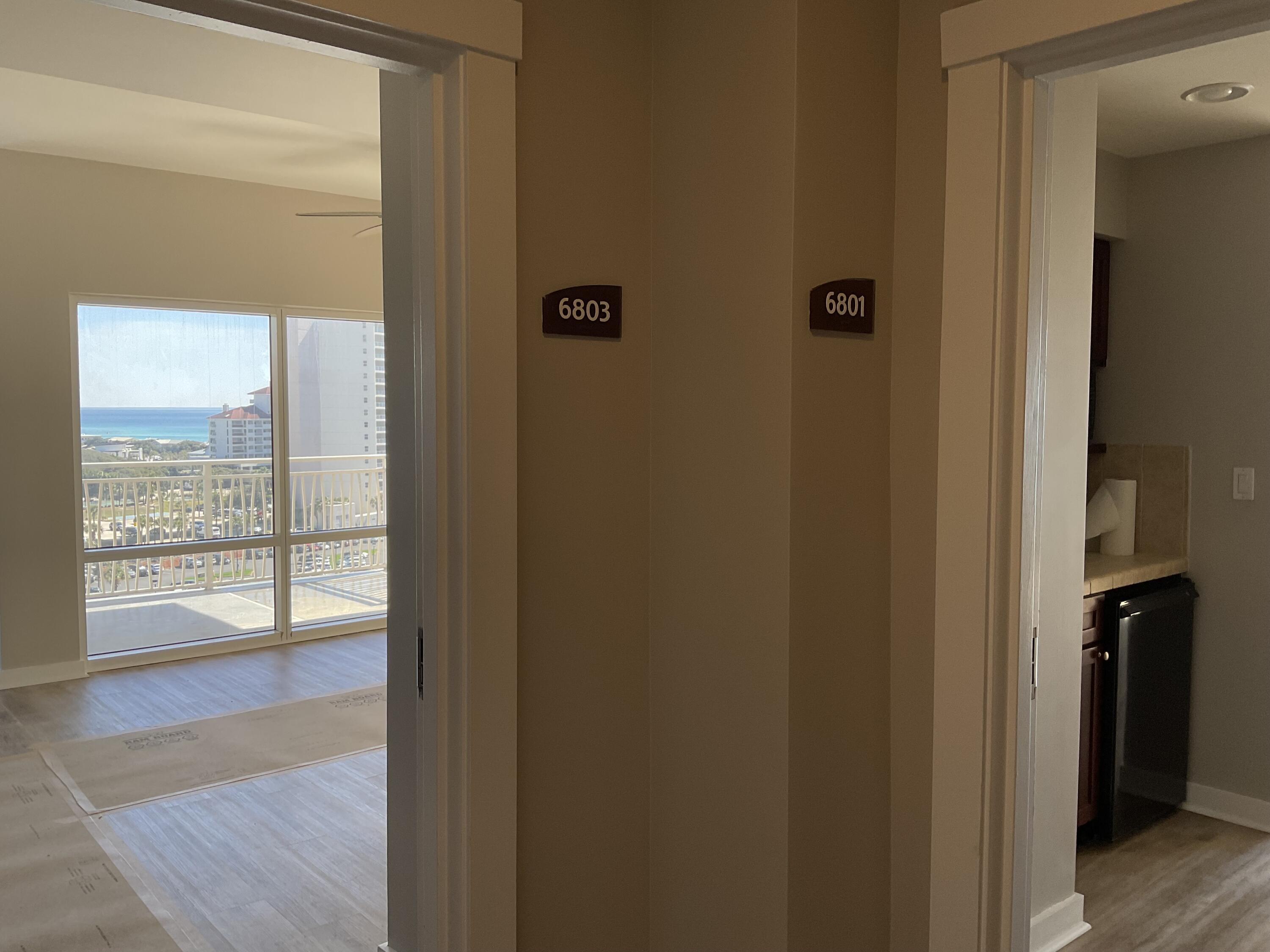 Views Views Views!!! 8TH Floor, SE. Corner - Unfurnished unit has absolutely incredible Views of the Gulf and the ever-popular Luau pool! In fact, the views from EVERY room are beautiful. On a clear day, you can see all the way to PCB from the wrap-around balcony. 6801-03 has new paint, new floors, ship-lap breakfast bar, and more, ready for you to personalize and decorate. Luau has a parking deck for each building (no assigned parking spaces) and each unit has a dedicated storage 'cage' located in a secure area near the ice machine. Enjoy your mornings at the beach and your afternoons at the lagoon style pool. There's a Tiki Hut by the pool, where you can purchase your favorite beverage as you relax and enjoy the sunshine.