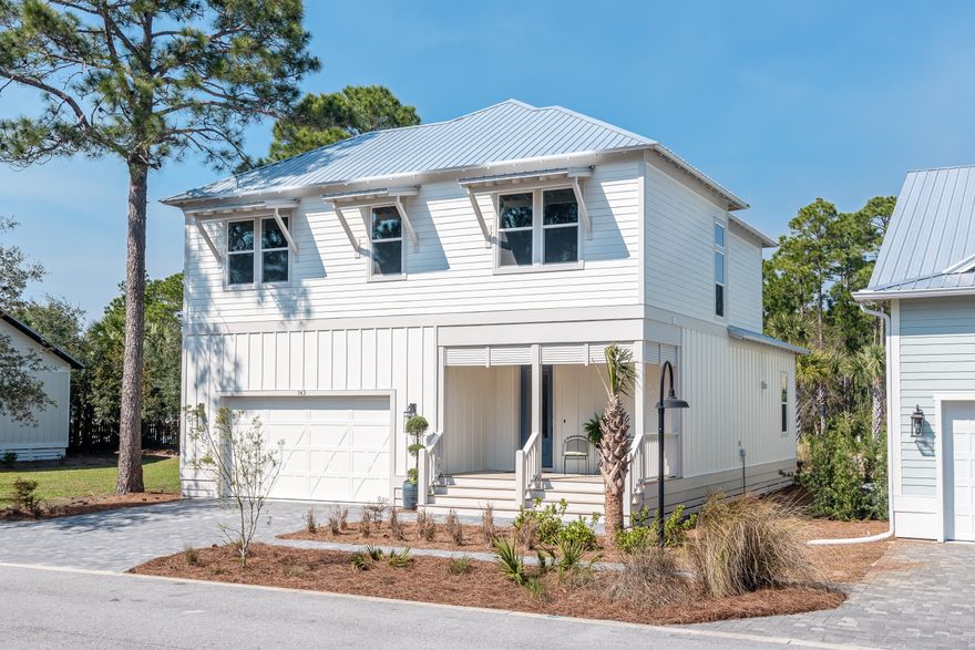 NEW CONSTRUCTION/ 3 bedroom 3.5 Bath in Hidden Grove, a gated community with a fabulous community pool. Home is solidly constructed with 2X6 framing, 8 Ft. Low E impact doors, and Low E impact windows, low maintenance Hardi board batten and lap siding, metal roof, and a wind rated garage door. Forget having to cover your windows in a storm, this is a lock-and-go home. Interiors are upgraded from the typical builder grade home. Home is well insulated, and has Energy Star Frigidaire Gallery series appliances. Oven is a slide-in range with convection oven, 50 gallon hot water heater. Home is essentially GREEN....no carpet! Home backs up to cul-de-sac, zero neighbors behind you. Walk out your back door and you are one lot away from pool gate. Enjoy three porches on this home....click more  Nice ceiling fans on covered porches.   Two covered porches on ground floor and an open porch off the master on the second floor. Home has two 14 seer energy efficient American Standard HVAC units. This is 3 bedrooms 3.5 baths in 2324 Sq Ft. and a two car garage. Each bedroom has en suite baths.  Luxury master with sitting area for comfy TV watching and reading.  Master bath has separate stand-alone tub and tiled shower. Both guest rooms have tub/shower combo. NO CARPET in this home, all flooring is either luxury vinyl plank, or ceramic tile flooring. Open concept plan with foyer walls clad in ship lap siding. All cabinets are DLV (Deorative Laminate Veneer full overlay) which is an upgrade and stronger than painted cabinets, with Shaker style door in popular silver grey color. All counter tops are white quartz. Plumbing and lighting fixtures are designer grade fixtures. Ceilings are 10 Ft. upstairs and downstairs. First floor hosts the foyer, powder room, kitchen, dining and living room, Great storage in this home.  Large walk-in pantry off kitchen and lighted storage under the stairs. Laundry has 42" cabinets and deep laundry sink with hand spray to wash your pets. Closet space galore in each bedroom. Master closet custom built is a dream! All landscaping has heat tolerant native grasses, plants and trees. Lot irrigated with city water so you will not get rust on home or walkways. Lot covered in pine straw. You don't have to mow anymore! Community has a large pool with bath houses, and central mailboxes. This lot backs up to a cul-de-sac. Walk right out your back door and you are just one lot away from the gated community pool.  It's like having your own private pool without the hassle. There are two public areas to launch your boat just minutes away. Low association dues of $240 quarterly. Gated, attractive community is just a little more than a mile north of the Santa Rosa Beach Wal-Mart, and a short drive to Sacred Heart and Publix. Looking to work or play on 30A. You have easy access to 98 with a stop light at W. Hewitt and Hwy 98. You can be on the west end of 30A in 5 to 7 mins. Builder purchased extended warranties on all kitchen appliances. Property in flood zone "X", no flood insurance required. Not in COBRA, can do VA and FHA lending. Home being sold unfurnished. Buyer to verify any and all information important to buyer. There is a one time capital contribution fee of $160 and a $250 transfer fee to the HOA.