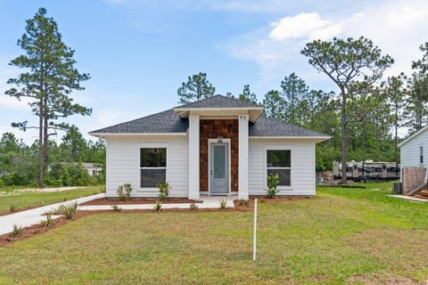 Photo of 63 E Raphael Road, DeFuniak Springs, FL 32433 (MLS # 977709) Photo of 63 E Raphael Road, DeFuniak Springs, FL 32433 (MLS # 977709)