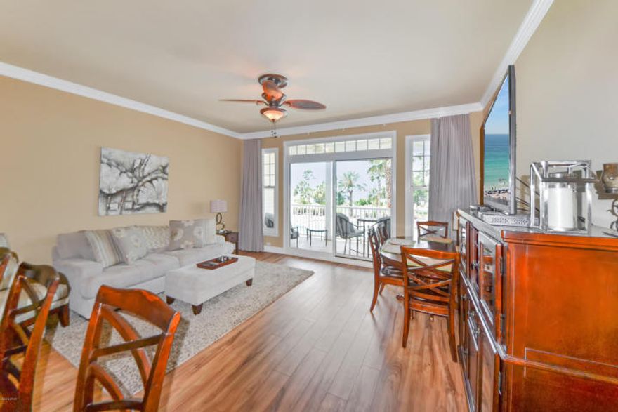 ENTERED FOR COMP PURPOSES ONLY - This beautifully furnished second floor unit at Reflections in Bay Point Resort overlooks Grand Lagoon and Reflections' large zero entry private pool. Spacious, open kitchen with GE stainless appliances, granite countertops, breakfast bar and tiled floors. The living room opens to a large covered balcony, perfect for enjoying your morning coffee as the Lagoon wakes or a glass of wine at sunset. Crown molding in the living room and laminate flooring throughout with the exception of of the kitchen and bathroom which both have tile flooring. You will also enjoy the double vanity with granite counter and luxurious, oversized, tiled walk-in shower with glass doors. Reflections Spa and Resort has an exercise room, along with the Serenity Spa.