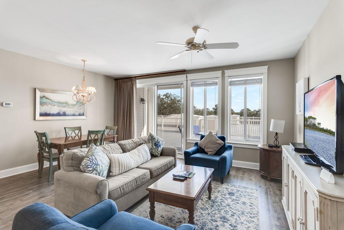 This well-priced condo is all about space. It has the largest floor plan in the Grand Sandestin building along with a full second bath and a huge balcony. Luxury wood-look flooring and soft beige walls create a comfortable ambiance in the elegant sitting area. A series of full-height windows and doors provide views and access to the balcony. Upscale furnishings and tasteful artworks enhance the appeal of this coastal retreat. The master suite is equally spacious with an ensuite bath including a twin vanity and tub with shower. A queen-sized sofa accommodates additional visitors and the full second bathroom is always appreciated by renters and guests. The open kitchen has everything you need for rustling up snacks and family meals with pantry storage and a breakfast bar for casual
