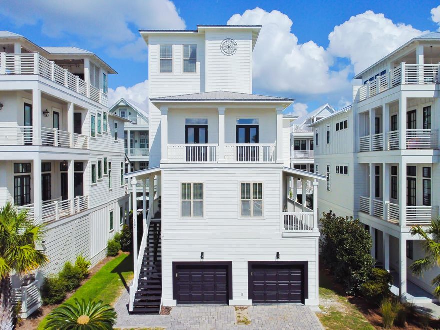 Located in the peaceful and highly desirable Grande Pointe at Inlet Beach community, this fully furnished 5-bedroom, 5-bathroom, 4-story coastal home is the perfect turn-key retreat or investment property--just a half-mile from the beautiful Gulf beach access, Camp Helen State Park, and Lake Powell. Boasting an entire fourth floor dedicated to a bonus room with a private full bath and balcony, the home offers flexible living space ideal for guests or entertaining. Thoughtfully updated in 2025, the property features all brand-new furnishings and decor down to the silverware, freshly painted exterior and interior, all five balconies fully rebuilt, brand-new toilets in every bathroom, and a recently serviced HVAC system--ensuring peace of mind and long-term comfort. Currently an active and  income-producing Airbnb, the home is designed for effortless enjoyment, with spacious bedrooms, open-concept living areas, and five private balconies to soak in the serene surroundings. Just minutes from 30A shops and dining, yet tucked away in a tranquil setting with access to a community pool, clubhouse, and dock on the lake - this home truly has it all - style, location, and immediate rental potential!