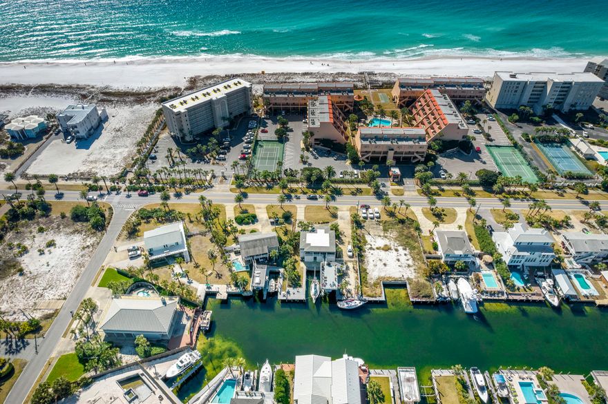 Entered for Comp purposes.  3/3 remodeled home just steps to the private beaches of Holiday Isle.  2 Deepwater upland slips and deck out over the water