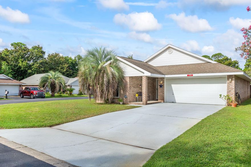 Welcome to your dream home nestled in a tranquil, meticulously maintained neighborhood--a true haven for those seeking serenity and comfort. This enchanting all-brick residence is situated on a generously sized corner lot, offering an ideal blend of privacy and accessibility. You'll find a peaceful retreat just a short stroll away from public access points to both the picturesque Sound and the scenic Intracoastal Waterway, making it easy to enjoy the natural beauty of the area. Upon entering, you'll be greeted by a thoughtfully designed split floor plan that ensures both privacy and convenience. The spacious master bedroom serves as a serene sanctuary, featuring a soothing neutral color palette that enhances the room's calming atmosphere. The elegance continues throughout with an exquisite