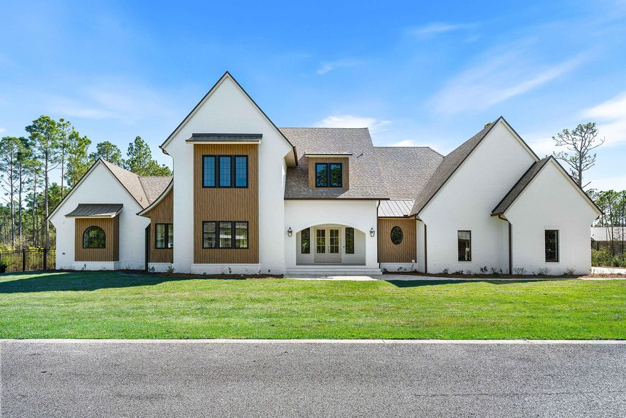 Now complete, 159 Seclusion Way is a refined new-construction estate set on the final one-acre homesite (Lot 48) within the gated bayfront community of Seclusion Bay. This thoughtfully designed residence spans 4,872 square feet and offers five bedrooms, five and one-half bathrooms, and a three-car garage, all curated with elevated finishes and intentional architectural detail. Outdoor living takes center stage with a 1734 resort-style pool, an 88 spa, and a fully equipped outdoor kitchen--creating a private coastal retreat ideal for entertaining and year-round enjoyment. Inside, expansive living spaces are defined by clean lines, warm textures, generous ceiling heights, and abundant natural light throughout. Seclusion Bay is one of Santa Rosa Beach's most sought-after hidden enclaves, known for its low-density setting, oversized homesites, and exclusive access to a private community dock on the Choctawhatchee Bay. Residents enjoy a rare blend of privacy and convenience, just minutes from the sugar-white beaches of 30A, premier dining, boutique shopping, championship golf, and the lifestyle offerings of Miramar Beach and Destin.

Whether envisioned as a primary residence, second home, or long-term investment, 159 Seclusion Way delivers a compelling combination of craftsmanship, scale, and coastal elegance. With the home now complete and entering Coming Soon status, this represents a rare opportunity to secure a newly finished estate in one of Santa Rosa Beach's most exclusive bayfront communities.