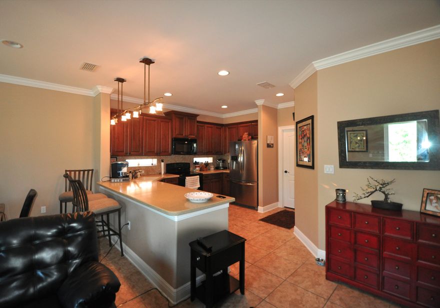 Not in a cobra zone, home has recently been updated throughout - brand new appliances, paint, window treatments and carpet upstairs. It is gorgeous! Wont last long. Move in ready home in Miramar Beach! Close to shopping and beaches. Downstairs you have two big living areas, amazing kitchen large laundry room. Built in doggy door and fenced in yard that is private. Upstairs is your master suite plus two bedrooms. Downstairs is another bedroom or office as well as bathroom. Extra storage in the garage and brand new garage door opener with smart phone technology. This home has all the bells and whistles. Less than a mile to the beach! A block to the bay. This home is concrete construction and the association dues cover all landscaping so very low maintenance living! Home Warranty