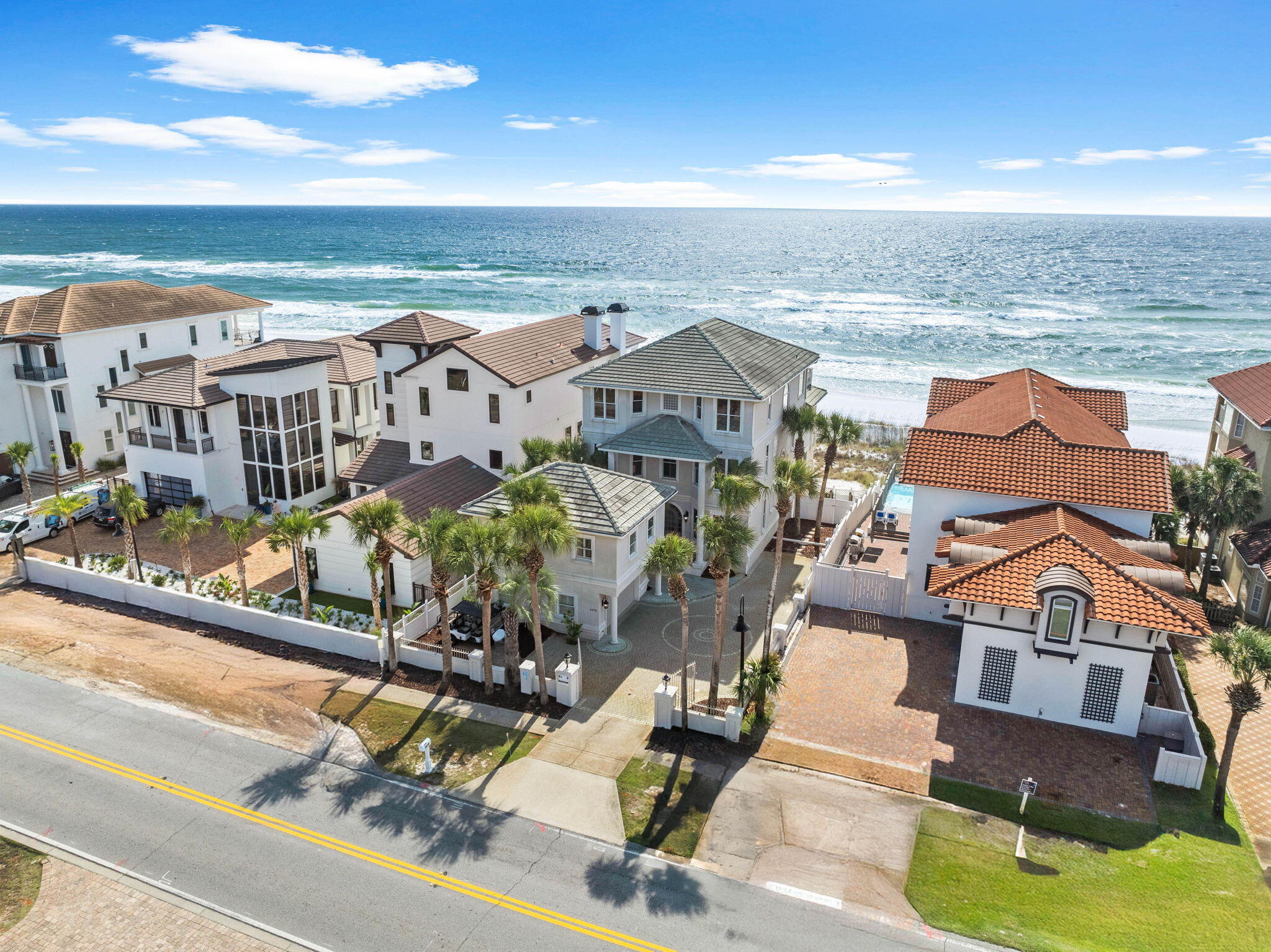 Discover the pinnacle of coastal luxury at Kings View--a breathtaking Gulf-front estate in Destin that redefines beachfront living. This fully furnished 7-bedroom haven offers direct private beach access and a secluded one-bedroom carriage house, making it the perfect escape for lavish entertaining or serene retreats. Step inside to experience panoramic Gulf views from every angle, and delight in a chef's kitchen designed to impress, complete with dual islands and top-of-the-line appliances. At Kings View, opulence and comfort merge seamlessly, offering an unmatched setting for unforgettable vacations or luxurious living. Step into the heart of the home and be captivated by the open-concept living, dining, and chef's kitchen, all designed to showcase breathtaking panoramic views of the Gulf. The gourmet kitchen, complete with dual islands and high-end appliances, makes every meal an event and every gathering unforgettable.

The first floor features a serene queen bedroom with an en-suite bath, providing comfort and seclusion for guests. An elegant curved staircase leads to the second floor, where
luxury awaits: a tranquil queen suite with a soaking tub and separate shower, and a unique queen-over-queen bunk room with a twin trundle, both featuring private baths. The lavish master suite, with its king bed, spa-inspired bath, and private balcony, offers front-row views of the Gulf's shimmering waters.

The third floor is an entertainer's paradise, complete with two additional queen bedrooms, a game room with a billiards table, and a cozy TV lounge ideal for memorable gatherings. A separate carriage house offers its own one-bedroom retreat with a private bath, ensuring guest privacy and comfort.

Kings View's residents enjoy exclusive access to Destiny Shores' premier amenities, including a luxurious community pool with a lushly landscaped deck and breezy gazebo, as well as a state-of-the-art fitness center. Nestled along Scenic Gulf Drive, this sought-after location combines coastal beauty with proximity to fine dining, boutique shopping, and local treasures. 

Live the dream at Kings View, a rare blend of timeless elegance and modern beachfront luxury.