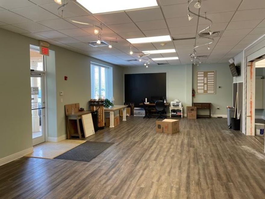 Fantastic opportunity to lease a ground floor Showroom with an option to lease an adjacent warehouse space.  This is a natural fit for another home decorating business that can feed off of the current business on going at Marquis Kitchen & Baths.  They manufacture cabinetry as well as everything needed for kitchen & bath remodels.  The space has a nice entry door, natural light pouring in these large windows, updated flooring, painting and a single restroom.  The rear of the space has a roll up door for easier access to materials for loading.  For an additional costs, the building has an adjacent 700 SF warehouse that could be leased as well.  The rent breakdown is as follows:  $3200 base rent plus triple net fees ($600) and electricity ($200) per month.