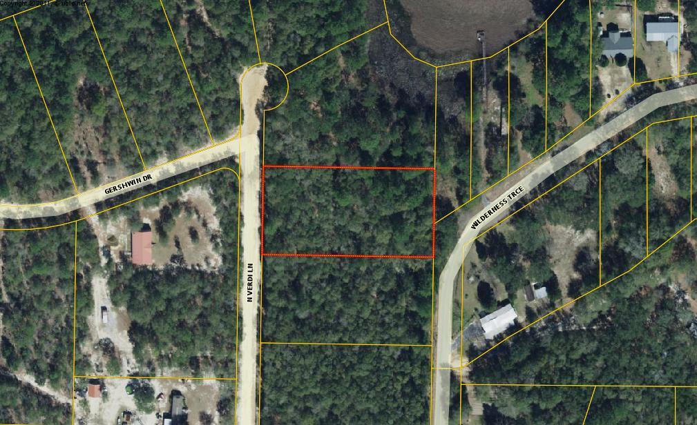 Nice 1 acre building lot. Based on the Urban Residential zoning, the property could be split into 2 1/2 building lots with access from either N Verdi or Wilderness Trace. The property is close to Juniper Lake, a 600+ state managed lake with great fishing and 2 public boat launch areas. It is only a short drive to historic DeFuniak Springs, recently voted the Best Small Town in Florida by msn.com.