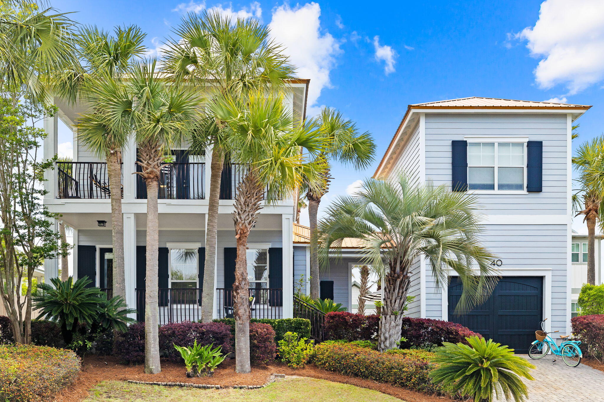 Ready to live the Florida Dream? This expansive, Florida cottage in the Village of Blue Mountain Beach has it all! This home offers spacious porches and a breezy layout. Inside, you'll find a kitchen, fireplace, living area, and master suite on the main. Upstairs, there's a 2nd master bedroom and two additional bedrooms. Bonus, there's a carriage house for guests!And that's not all! Village of Blue Mountain Beach gives you a pool, cabana, putting greens, and more. Another bonus, the beach is just a short walk or bike ride, less than 1/2 mile way! With all of the local amenities of 30A just a stone's throw away, there's never a dull moment.