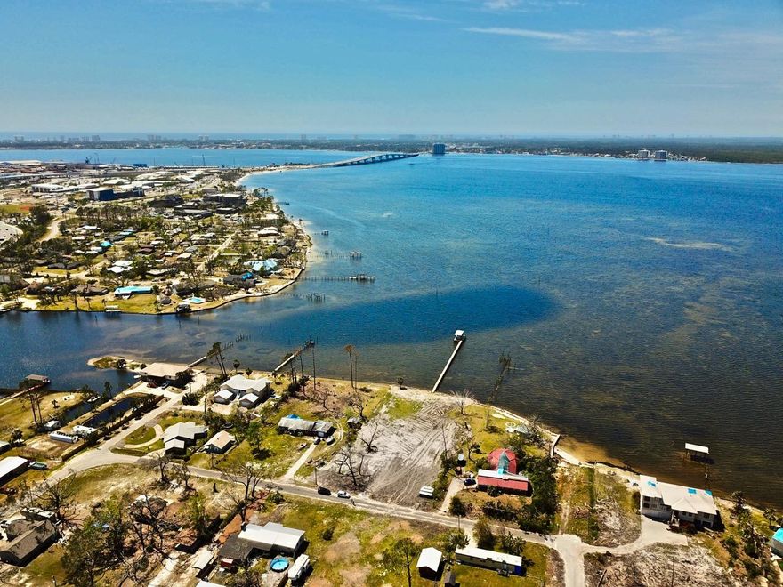 WOW! 50 feet of bay front with seawall! This property is 300 feet deep with plenty of room for large home, pool and green space. bay front yard facing the west for the best sunsets in the world. Just a quick boat ride to shell island! House plans are available for this site.Agent to Agent Remarks: Go show. Any questions call or text Sam Warren @ 228.380.0511