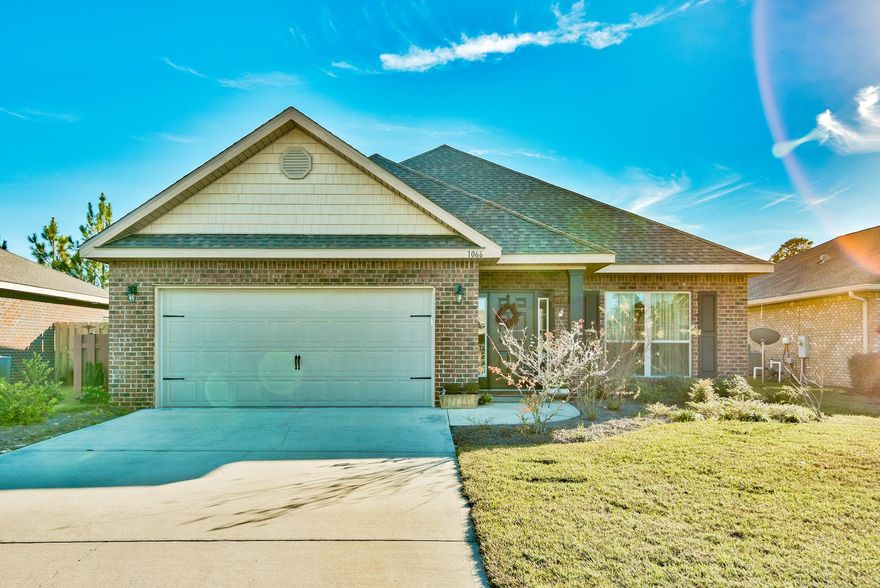 Your opportunity to own in the sought after community of Driftwood Estates! This beautifully maintained home features 3 bedrooms, 2 baths, an office or formal dining area and a 2 car garage. This open floor plan features engineered hardwood throughout, dark wood cabinets, stainless appliances, recessed lighting, ample granite counter space and an island create a beautiful and functional kitchen. Open archways in the common rooms and tray ceilings add an elegant flair. The master bedroom features a tray ceiling, crown molding, plentiful natural light and an en-suite master bathroom with a dual vanity, separate tub and tiled shower. 2 additional bedrooms and an office offer all the space you could need. The enclosed patio overlooks a huge fenced yard with plenty of privacy.