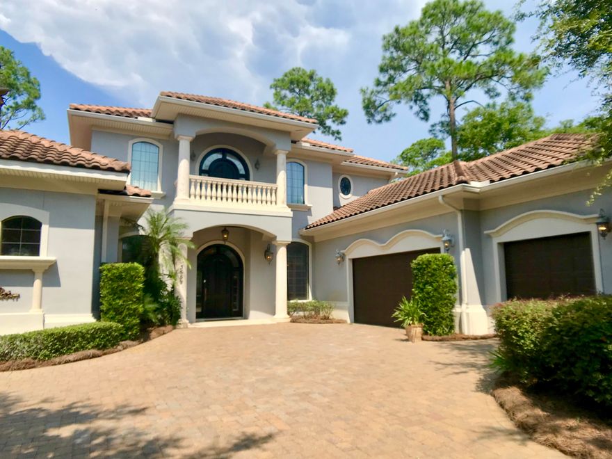 Beautifully updated 4 BR Mediterranean home in the exclusive gated community of Burnt Pine within Sandestin Resort!! Chef's kitchen includes high end appliances, large island, hot water pot filler, breakfast bar and spacious breakfast area. The great room has a fireplace and tons of natural lighting overlooking the enclosed patio. Large sliding glass doors walk out to the gorgeous gunite pool w/ waterfall and outdoor kitchen, perfect for entertaining family and guests! The spacious master bedroom located on the first floor has tray ceilings, his & her custom closets, and spa-like master bathroom. Upstairs bedrooms also have their own private bathrooms. Home also has a two car garage. Buyer is to verify sq ft/info.