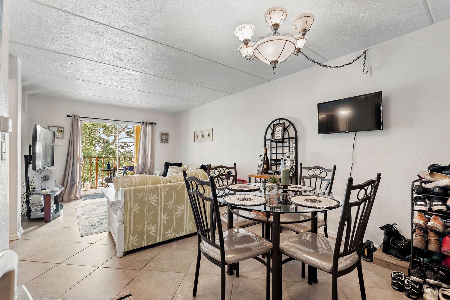 One the most beautiful waterfront condos in Cedars. This one bedroom unit has been meticulously updated with wonderful views of the Intracoastal Waterway aka. Santa Rosa Sound. Upon entering the unit you'll immediately notice your bright water view shining through the sliding glass door. Just to the left is the amazing kitchen, with newer all wood white shaker style cabinets featuring soft close doors and drawers, dovetail joints on the drawers, a hidden garbage can cabinet that you can open with your foot using the spring loaded lever at the toe kick. Stainless steel appliances, granite counters and a wonderful shiplap wall inset to hang your pots and pans. The roomy dining area is just opposite the kitchen and has a small niche with power, perfect for a small electric fireplace.