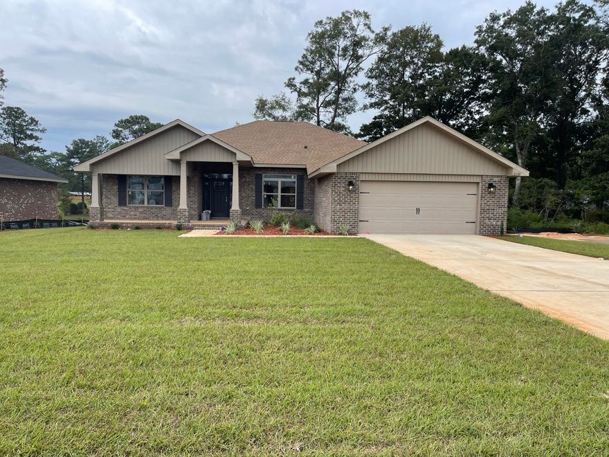 This home features 4 bedrooms and 3 full baths, one baths and a split floorplan as well. The master bedroom has a trey ceiling with ceiling fan and opens to the master bath with 2 walk in closets, separate but dual vanities as well as a walk in shower and garden tub. The floors are upgraded with LVP and bedrooms have durable plush carpeting. Both kitchen and bath countertops are granite.The kitchen overlooks a breakfast nook and has a breakfast bar. The formal dining room is at the front of the house. Entering the front door a large living room awaits you and ahead enter the spacious family room. The back has a covered lanai and the house is 4 sided brick. Sprinklers are front and back and the property comes sodded and landscaped. This home comes with a 10 yr Bonded Builders Warranty.