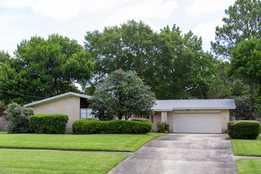 Kenwood charmer! Did you know Kenwood is one of the few neighborhood's in FWB? This makes for a safer neighborhood. This home has been completely rewired with copper wiring and a new roof in 2017. Lovely Florida room off the back of the home can be used for many purposes depending on your lifestyle. The kitchen has been updated with a back splash, a new stove, microwave, and custom cabinets which provide an enormous amount of space for all those big storage items. The kitchen over looks the living room and a wood burning fireplace. So cozy! The home has 3 bedrooms w/1 bedroom being used currently as an office but the custom cabinets are removable if the 3rd bedroom is needed.
Plenty of parking in the 2 car garage and over 4 spaces in the driveway.