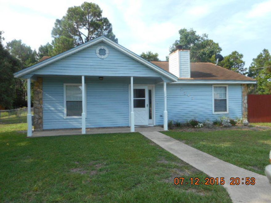Cute three bedroom/2 bathroom home in Navarre.Beautiful wood-look tile flooring in living areas and carpet in the bedrooms. Eat-in-kitchen with stainless appliances. Wood burning fireplace in living room. Large yard with lots of room. Shed in the back for additional storage. Back yard is fenced and has a lawn pump and sprinkler system. Home features a circular driveway for ease of entry/exit.