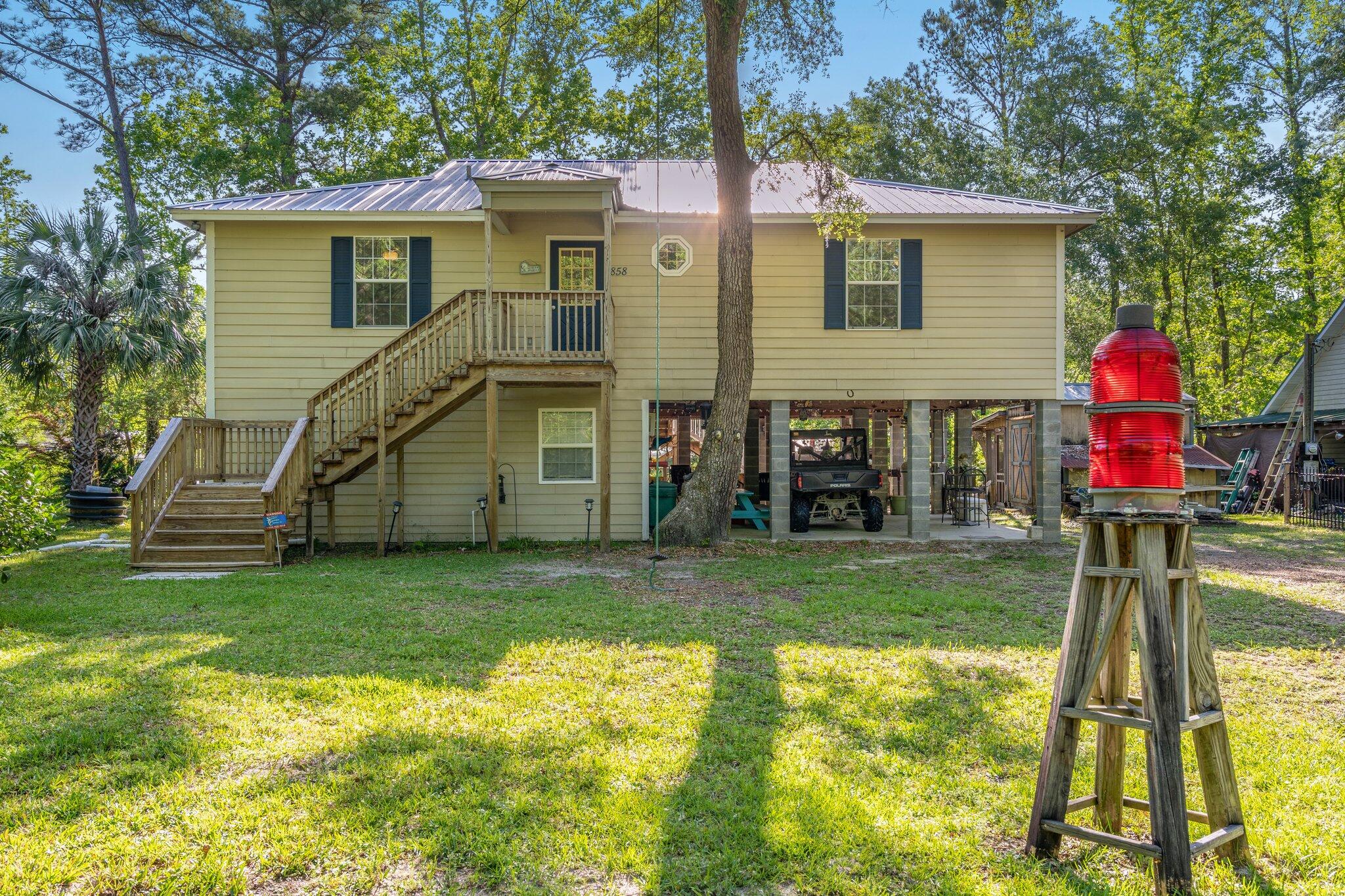 Live the river life in Bunker! Conveniently positioned on the river between the Choctawhatchee Bay and some of Florida's most beautiful natural springs. Fish off your dock, sit on your porch and enjoy the afternoon breeze, or take a boat ride out to the Bay.... there is endless fun and relaxation to be had.This canal front home exudes spaciousness with a total of 3 beds and 3 baths that includes an efficiency unit downstairs. New roof, new hot water heater, new AC... this waterfront home has it ALL! You HAVE to see it to believe it!Buyer to verify all information & measurements deemed important.
