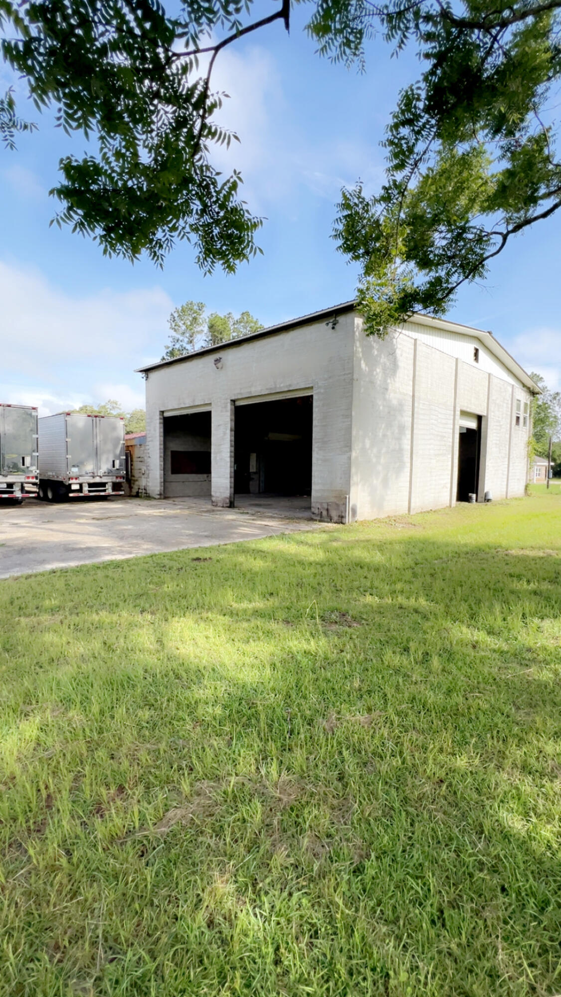 If you are looking for somewhere to store your toys, this could be the property for you!At just over 6000 sq ft under roof, this huge concrete block shop is perfect with a variety of open, adaptable workspaces.Concrete block construction for superior structural integrity and long-term durability.High ceilings ideal for machinery, storage, or vehicle access.Large bay doors and loading access for seamless logisticsAmple on-site parking on the large near 2 acre Parcel with potential for expansion or customization based on your specific operational needs.