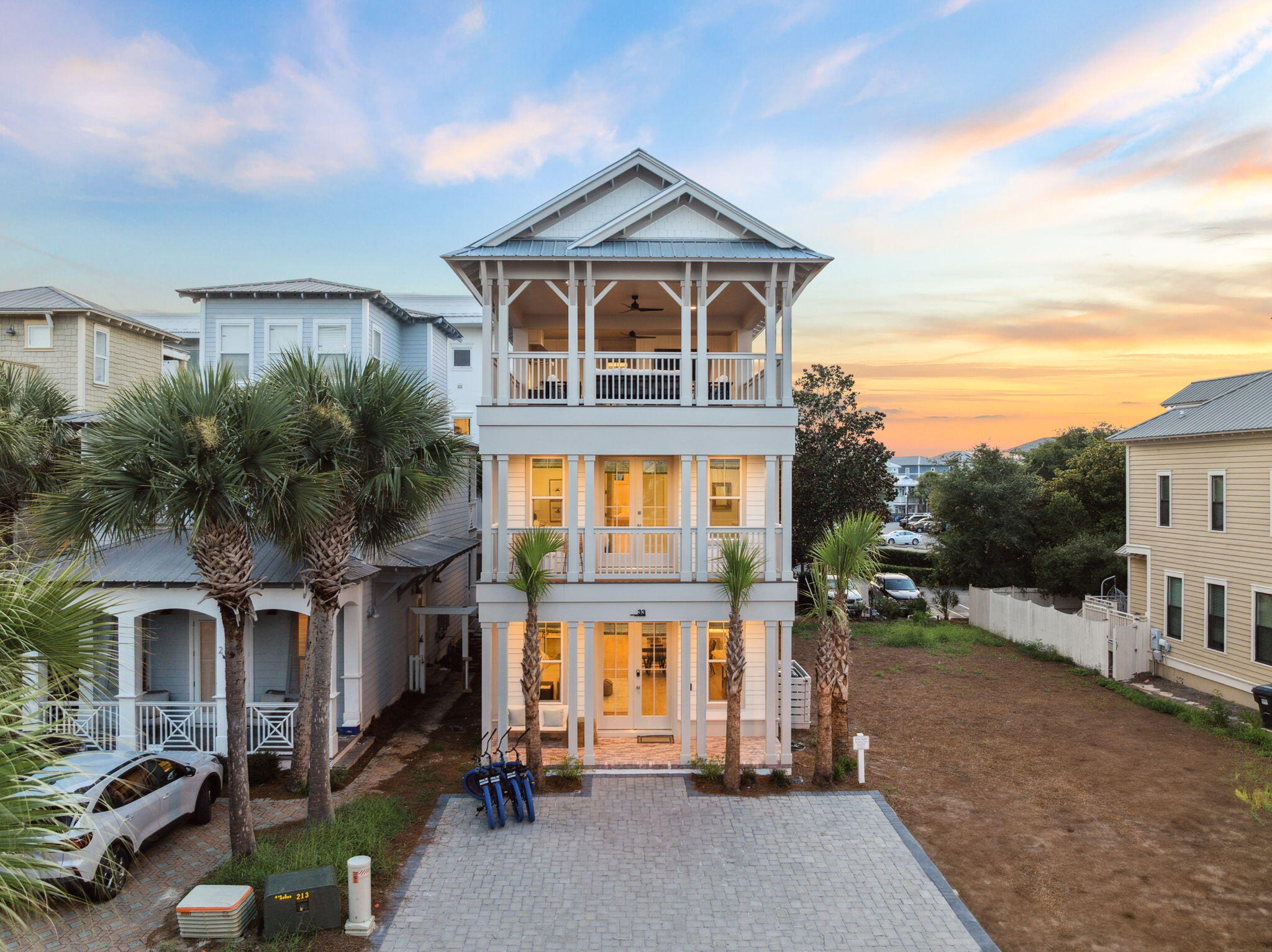 Brand New Construction, Fabulous Gulf Views & Fully-Furnished! Presenting a unique, newly-built property just steps from the beach, 33 Sand Flea Drive is the ultimate 30A vacation home. Located at the forefront of Seacrest Beach, this lovely home can be a lucrative investment property with rental projections at $178K and cash on cash return projections at 5% annually. In prime walking distance to Alys & Rosemary Beach, this refreshing escape has the perfect floor plan. On the first level, you're greeted with a huge living room, open dining space & fully-loaded chef's kitchen. The first level also has a guest bedroom, full bathroom and back porch. The second level features an enormous bunk room with 8 built-in bunk beds and an ensuite bathroom. Additionally, you have a spacious primary bedroom with a private balcony on this level. The top floor boasts an enchanting primary bedroom with a large built-in bar and access to the top floor veranda. The top floor veranda is a show-stopper featuring a luxe summer kitchen, outdoor dining area, TV, comfortable seating area and a fabulous view of the Emerald Coast. This gorgeous escape is offered fully-furnished and rental-ready. Set up an in-person or virtual tour today!